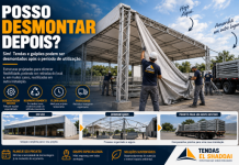 Posso Desmontar Depois? Entenda as Estruturas Desmontáveis Tenda desmontável sendo desmontada por equipe especializada